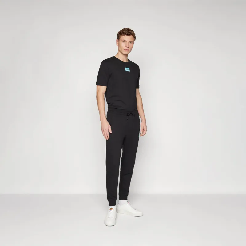 BAS DE SURVÊTEMENT HUGO EN MOLLETON DE COTON NOIR AVEC ÉTIQUETTE LOGO BLEUE DOAK212