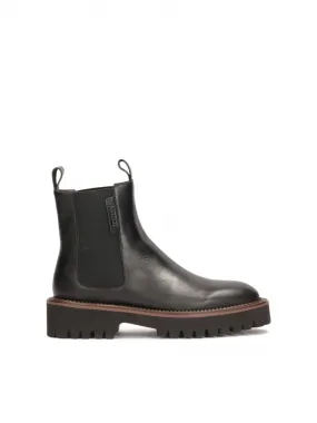 Bottes Chelsea noires avec un liseré marron sur la semelle 